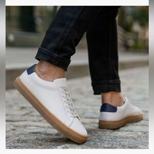 COMMON PROJECTS 
White w/ Navy trim Leather Achilles Sneakers. Size 38 (W7.5)